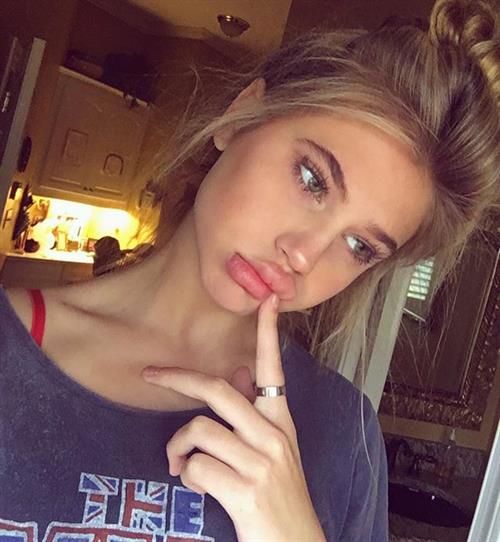 Meredith Mickelson taking a selfie