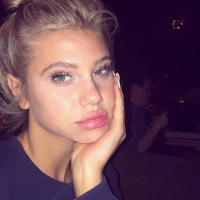 Meredith Mickelson taking a selfie