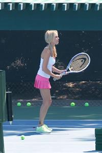 Heather Locklear - Playing with a pink dress Tennis in Malibu (Aug 1, 2012)