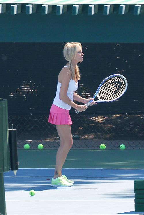 Heather Locklear - Playing with a pink dress Tennis in Malibu (Aug 1, 2012)