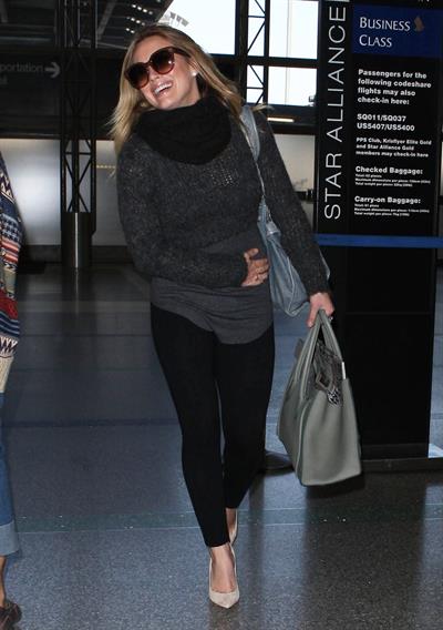Hilary Duff departing on a flight at LAX Airport 2/18/13 