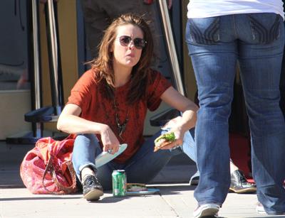 Jessica Stroup takes a break on the set of 90210 in Los Angeles on February 26, 2013