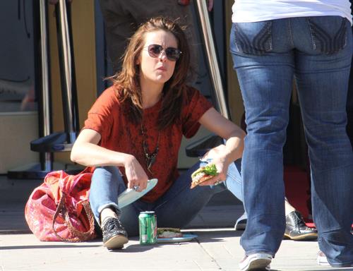 Jessica Stroup takes a break on the set of 90210 in Los Angeles on February 26, 2013