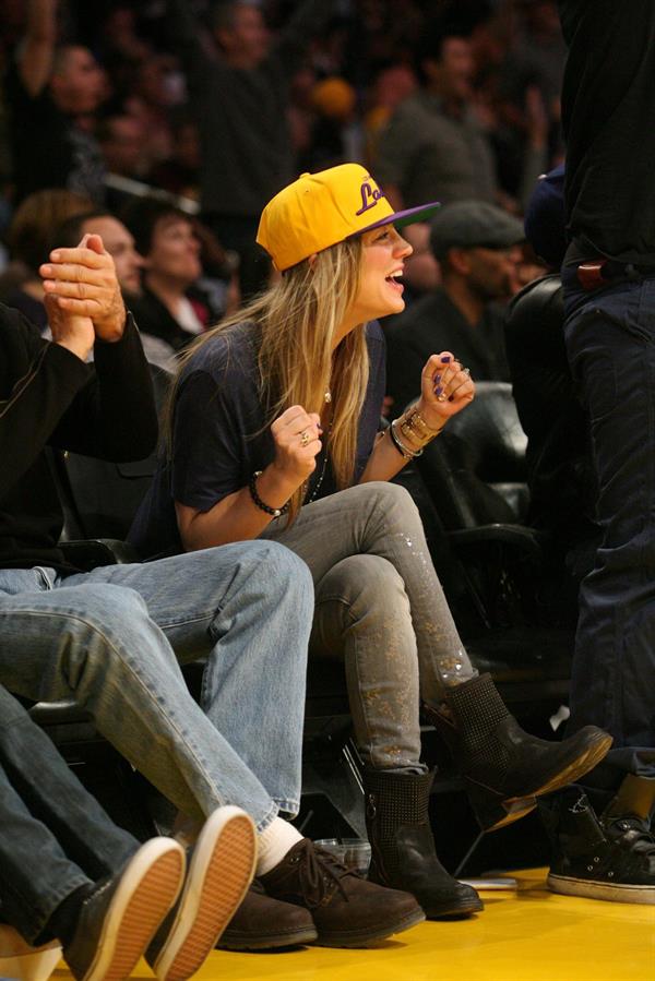 Kaley Cuoco attending a Los Angeles Lakers vs New York Knicks basketball game in LA on December 29, 2011