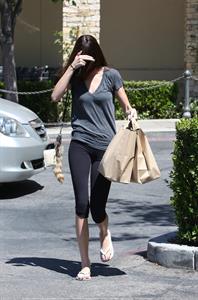 Kendall Jenner Hides her face while strolling through Calabasas on May 29, 2013