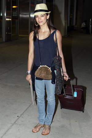 Kristin Kreuk - Pearson International Airport arrival candids in Toronto (July 16, 2012)
