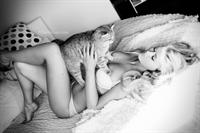 Maria Anohina in a Photoshoot with her cat.  Alisa Verner photographer