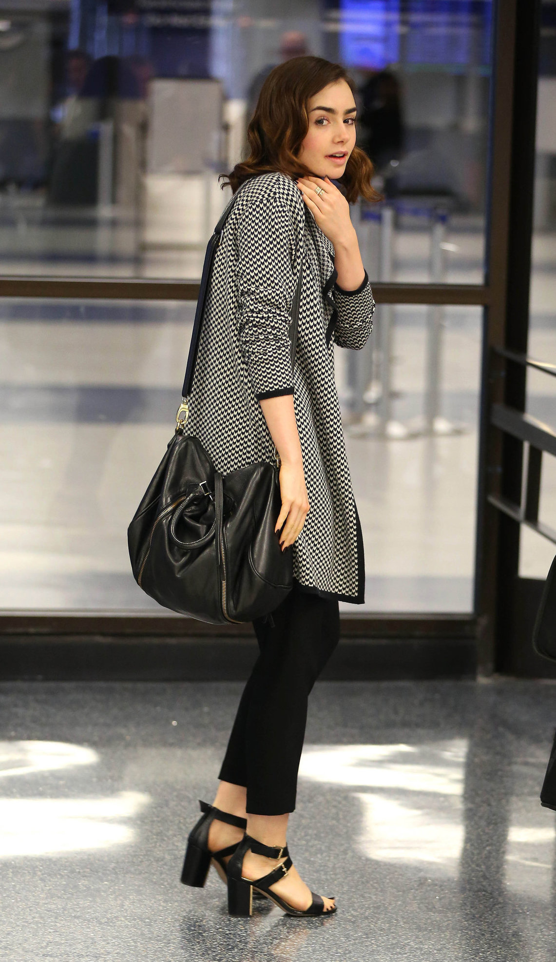 Lily Collins - LAX Airport 8/27/13