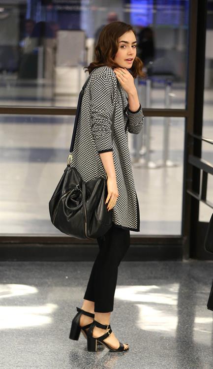 Lily Collins - LAX Airport 8/27/13