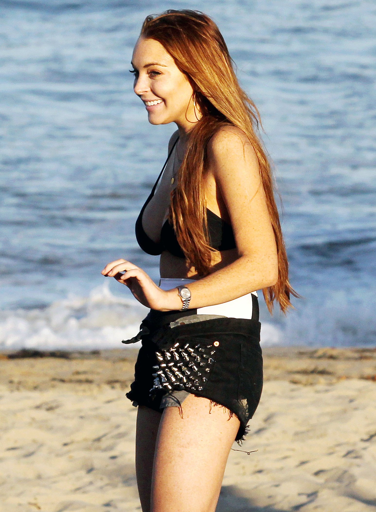Lindsay Lohan - arriving to the beach in Malibu - August 12, 2012