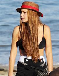 Lindsay Lohan - arriving to the beach in Malibu - August 12, 2012