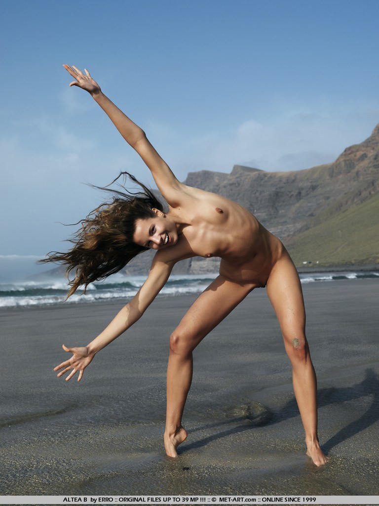 Altea B looks sexy covered in mud and rolling in the water getting dirty.