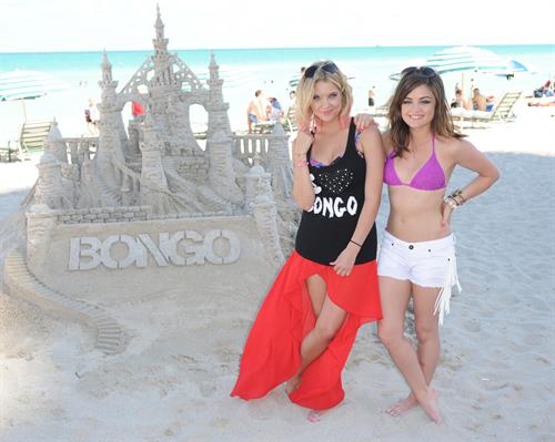 Lucy Hale Bikini Pictures Lucy Hale and Ashley Benson photoshoot at the Bondo Bikini Shack on Miami Beach on March 24, 2012