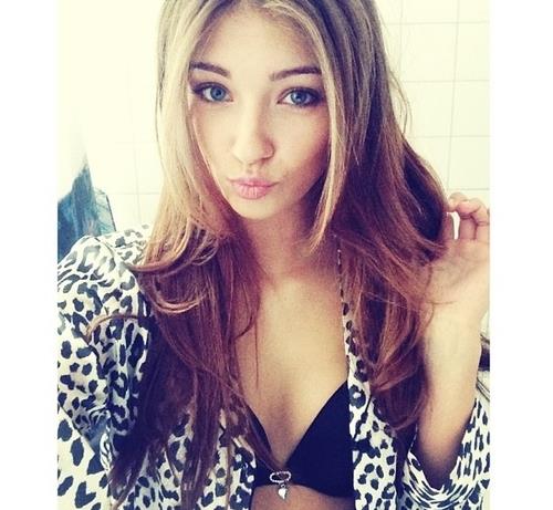 Lorena Rae in a bikini taking a selfie
