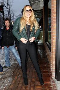 Mariah Carey made another stop at the Louis Vuitton store to shop with a family member. December 24, 2012 