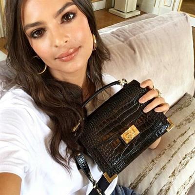 Emily Ratajkowski taking a selfie