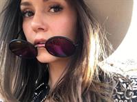 Nina Dobrev taking a selfie