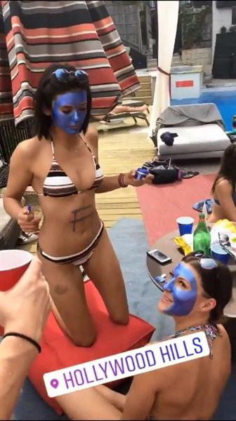 Nina Dobrev in a bikini