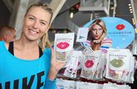 Maria Sharapova Sugarpova stand during day five of the Mutua Madrid Open tennis tournament May 8, 2013 