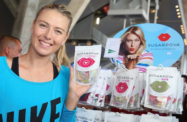 Maria Sharapova Sugarpova stand during day five of the Mutua Madrid Open tennis tournament May 8, 2013 