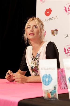 Maria Sharapova poses during Maria Sharapova launches her Sugarpova Candy Collection December 13, 2012 