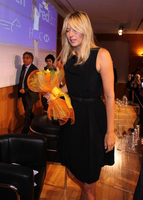 Maria Sharapova attends a press conference to present Saturday's exhibition match Milan November 30, 2012 