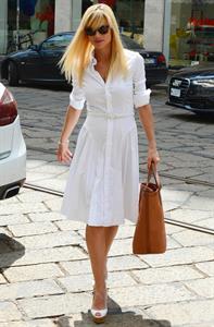 Michelle Hunziker Leaving her house in a white dress in Milan Italy on May 9, 2013