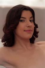 Xenna in  Xenna  for Errotica Archives - Xenna sensually poses on the bed baring her nubile body.