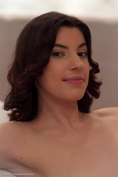 Xenna in  Xenna  for Errotica Archives - Xenna sensually poses on the bed baring her nubile body.