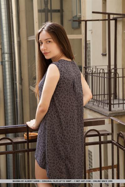 Maxima in  Andea  for MetArt - Maxima sensually strips on the chair baring her sweet pussy.