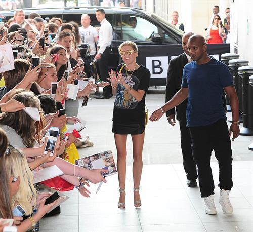 Miley Cyrus Pictures Miley Cyrus Spotted in a Join A Weird Trip T-shirt outside the London Studios in London (18.07.2013)