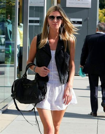 Nicky Hilton in a short white dress while shopping in Beverly Hills March 1, 2013 