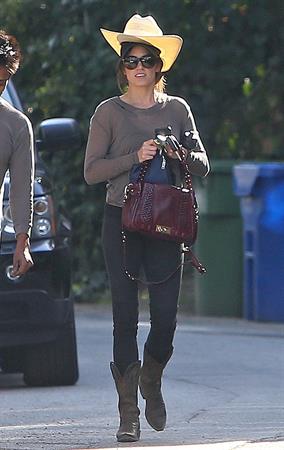 Nikki Reed walking and wearing her cowboy hat in Los Angeles on February 21, 2013