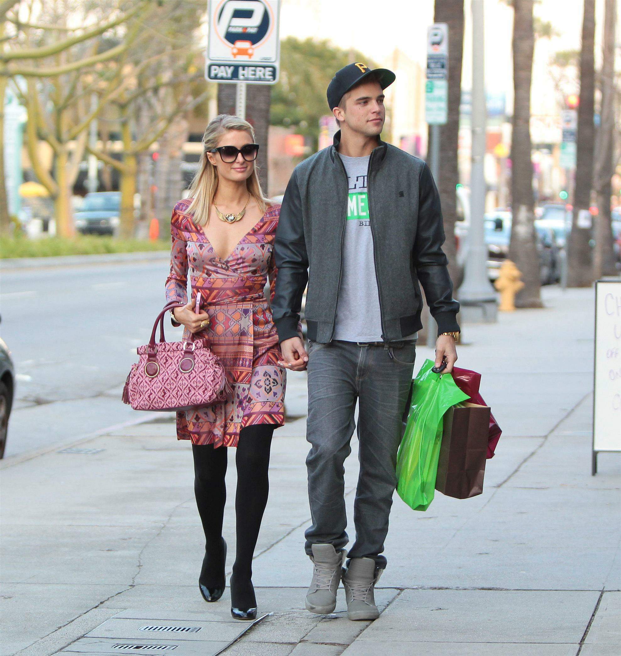 Paris Hilton and River Viiperi shop in Beverly Hills. February 9, 2013 