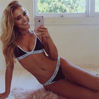 Georgia Gibbs in a bikini taking a selfie