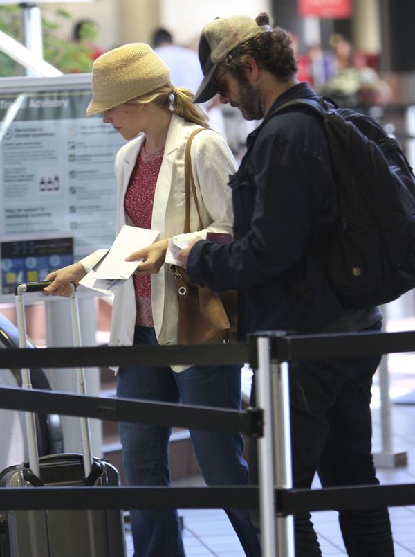 Rachel McAdams - Departs on a flight at LAX airport - August 9, 2012