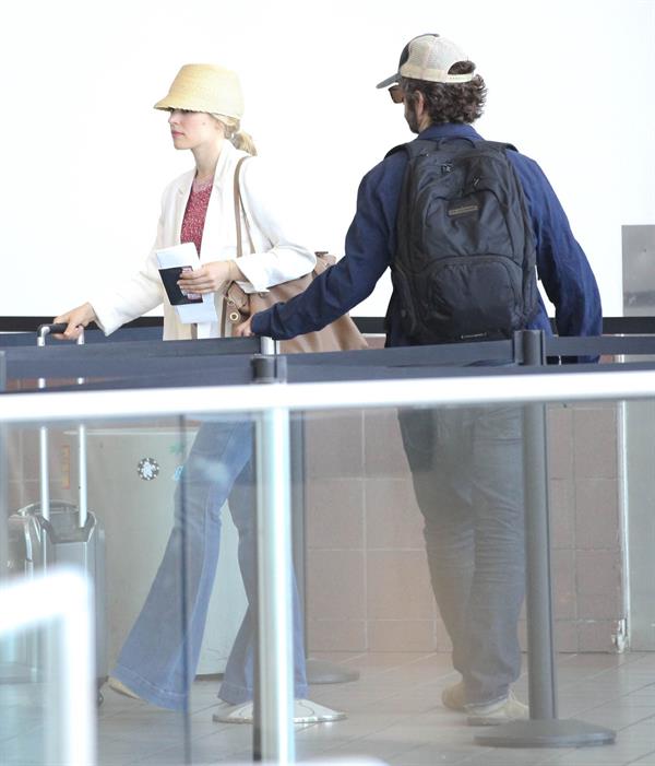 Rachel McAdams - Departs on a flight at LAX airport - August 9, 2012