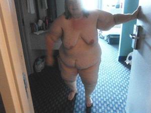 Showing myself in a hotel room in front of an open door