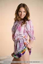 Viviann in  Presenting Viviann  for MetArt - Newcomer Viviann sensually strip in the studio baring her petite   body.