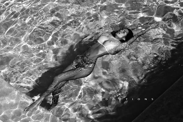 Alessandra Sironi in a bikini - breasts