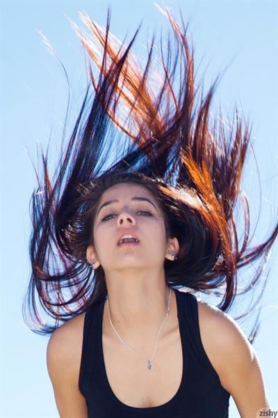 Sporty Megan Salinas in a dress and pink shoes