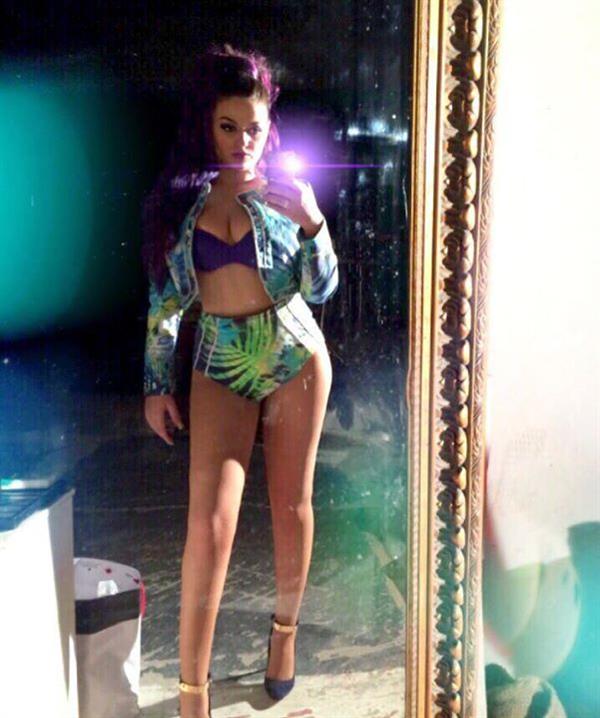 Enca Haxhia in a bikini taking a selfie