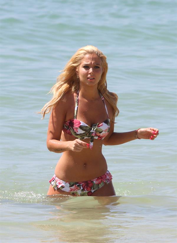 Tulisa Contostavlos in a bikini on the beach in Honolulu July 31, 2012