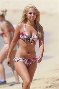 Tulisa Contostavlos in a bikini on the beach in Honolulu July 31, 2012