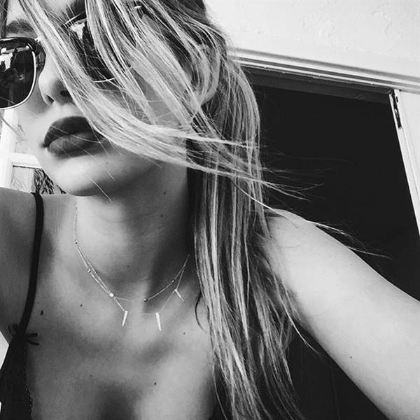 Camila Morrone taking a selfie