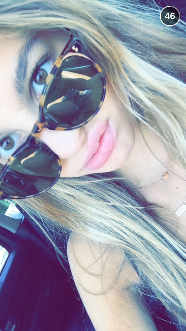 Camila Morrone taking a selfie