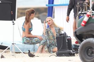 Minka Kelly and Rachael Taylor film Charlie's Angels on a beach in Miami 02-09-2011
