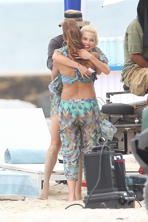 Minka Kelly and Rachael Taylor film Charlies Angel's on a beach in Miami 02-09-2011