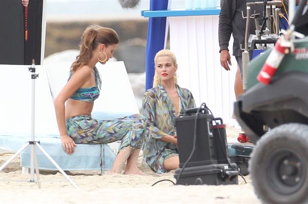 Minka Kelly and Rachael Taylor film Charlie's Angels on a beach in Miami 02-09-11