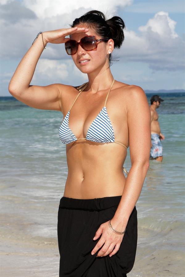 Olivia Munn on the beach